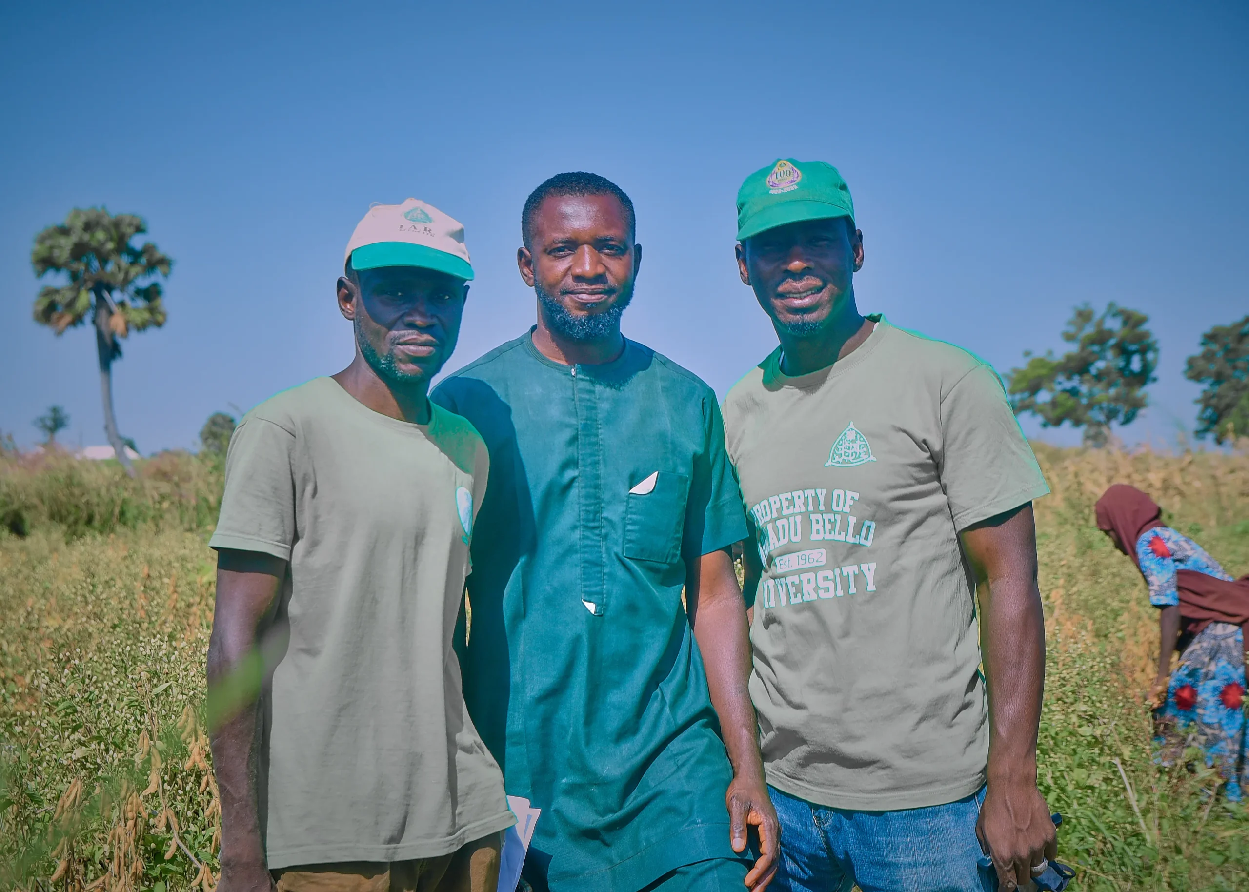 Agricultural partners in conversation during a field visit