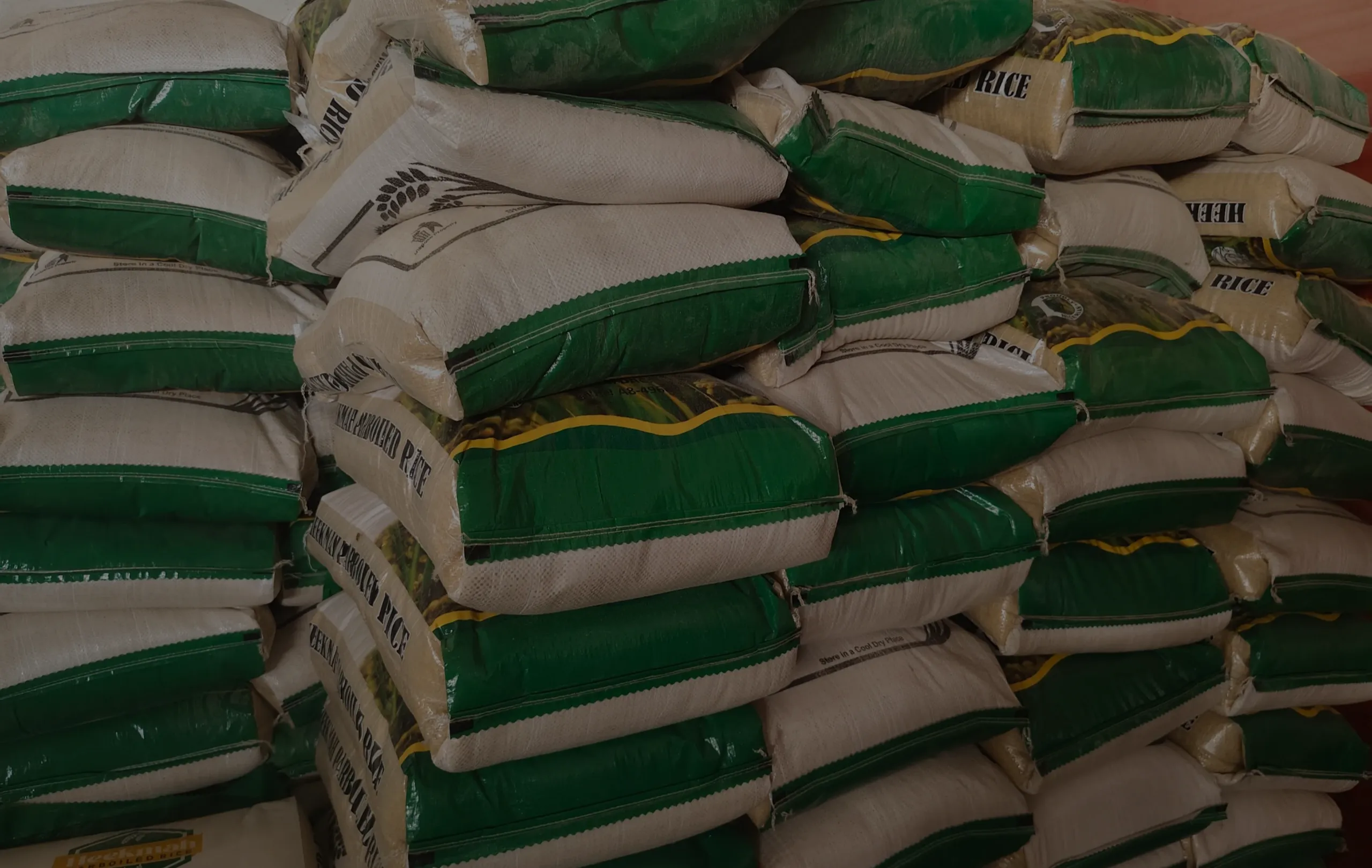 Stacked bags of Heekmah Rice ready for distribution